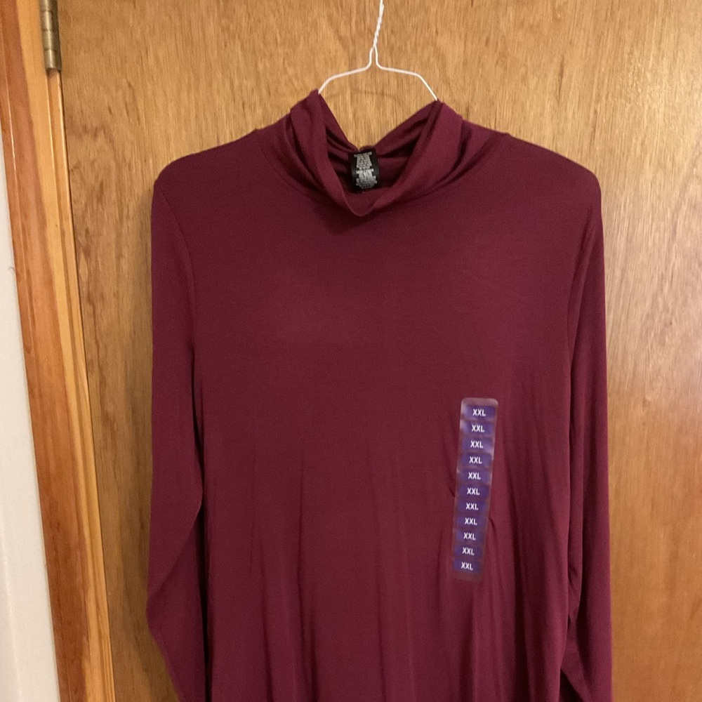 Long sleeve Cherry Jubilee mock turtleneck blouse with split side